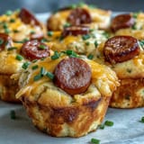 Savory mini corn dog muffins, a delicious bite-sized American party appetizer.