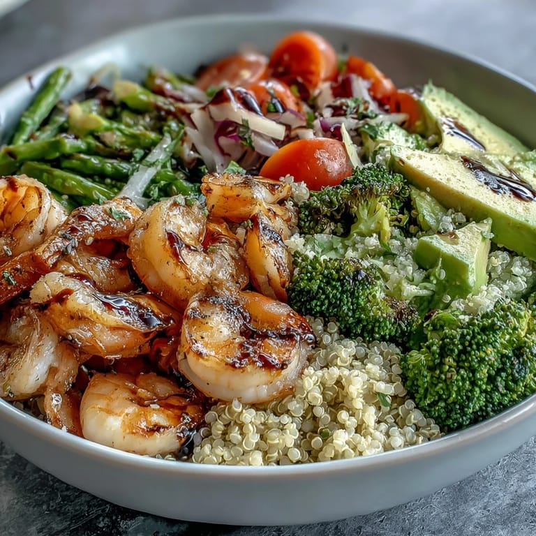 Vibrant shrimp and quinoa Buddha Bowl, a light and nourishing meal.