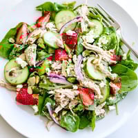 Crisp salad greens topped with tender shredded chicken, sweet strawberry slices, and cucumber ribbons, drizzled with creamy poppy seed dressing.  